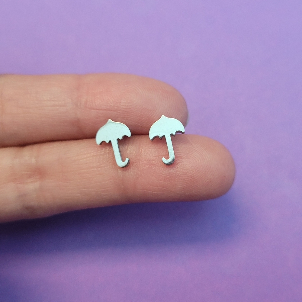 Cute, simple umbrella shaped silver stainless steel stud earrings. NEW!